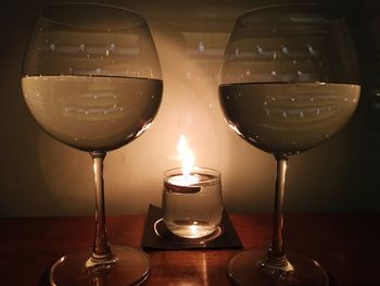 Close-up of tea light candle on table