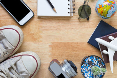 High angle view of mobile phone on table