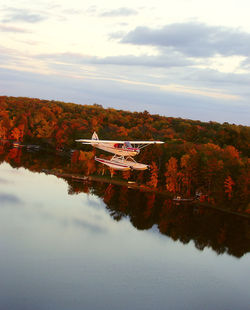 Scenic view of lake against sky during autumn