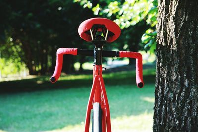 Close-up of red metallic structure in park