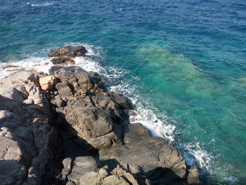 High angle view of rocks on beach