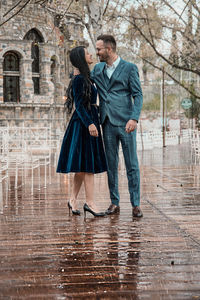 Full length of a woman with umbrella