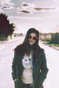 Portrait of young woman in sunglasses