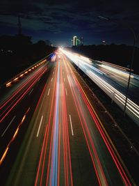 High angle view of light trails on road