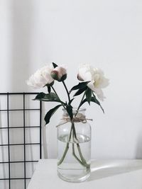 Close-up of white flower vase on table