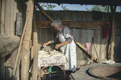 Man working on wall