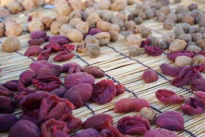 Close-up of dry apricots on mat