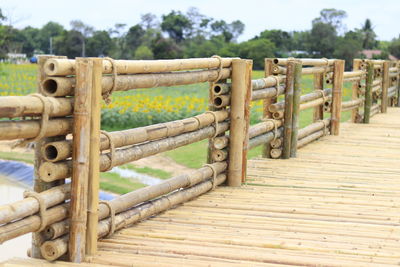 Close-up of wooden fence against sky