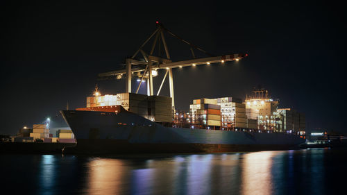 Illuminated commercial dock at night