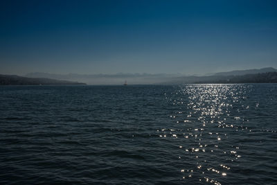 Scenic view of sea against clear sky