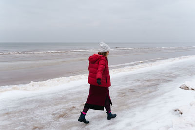 A woman in warm