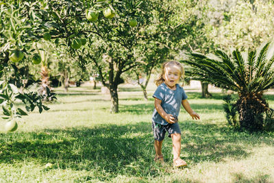 Portrait of cute boy in park