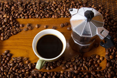 High angle view of coffee cups on table
