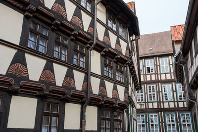 Low angle view of buildings against sky