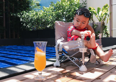 Portrait of boy playing in cafe