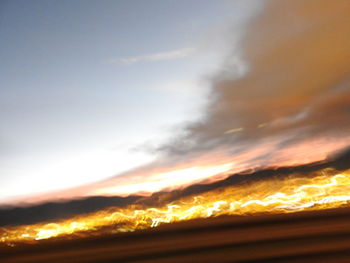 Scenic view of dramatic sky during sunset