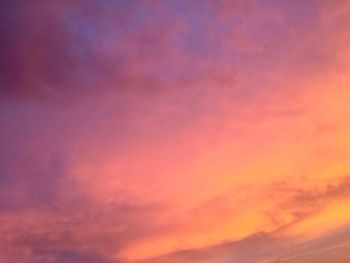 Low angle view of dramatic sky during sunset