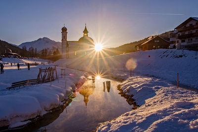 Scenic view of snowcapped mountains against sky during winter