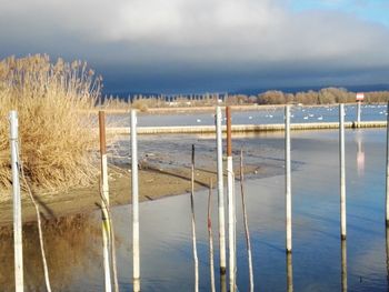 Scenic view of frozen lake against sky