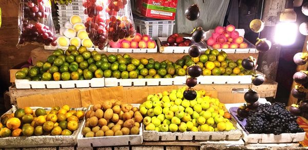 Various fruits for sale at market stall