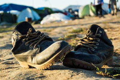 Low section of man relaxing on ground