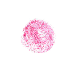 Close-up of pink ball against white background