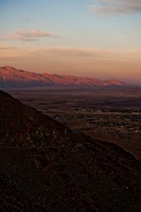 Scenic view of landscape against sky during sunset