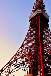 Low angle view of tokyo tower against sky in city