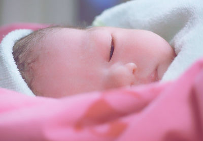 Close-up of baby lying down