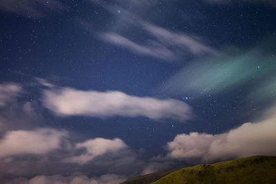 Low angle view of star field against sky at night