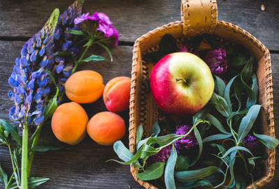 Fruits in basket on table