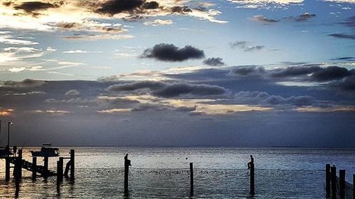 Scenic view of sea at sunset