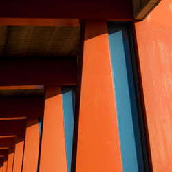 Low angle view of orange architectural columns