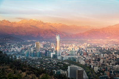 High angle view of cityscape against sky during sunset