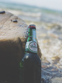 Close-up of wine bottle against blurred background