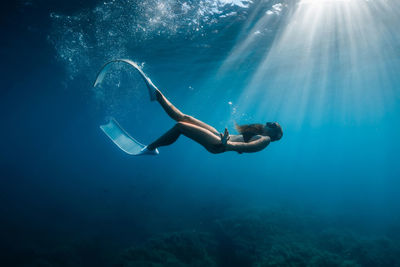 Man swimming in sea