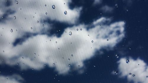 Rain drops on water surface