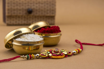 Close-up of rakhi on table