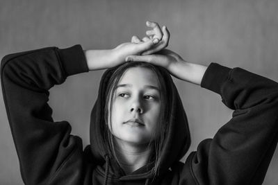 Portrait of teenage girl wearing hat