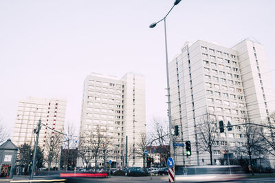 Low angle view of modern buildings against clear sky