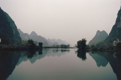 Reflection of trees in calm lake