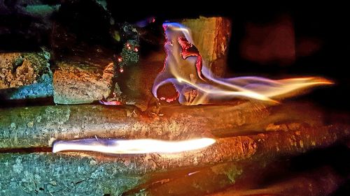 Close-up of water on rock at night