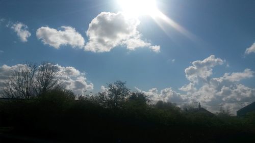 Scenic view of landscape against cloudy sky