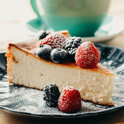 Close-up of strawberries in plate on table