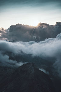 Scenic view of mountains against sky during sunset