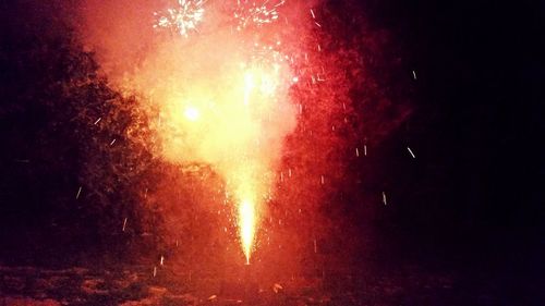 Close-up of firework display at night