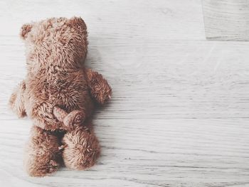 High angle view of teddy bear on table