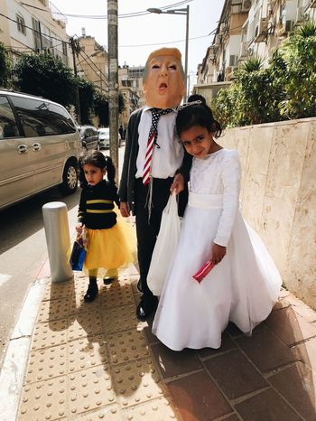 FULL LENGTH PORTRAIT OF MOTHER AND SON