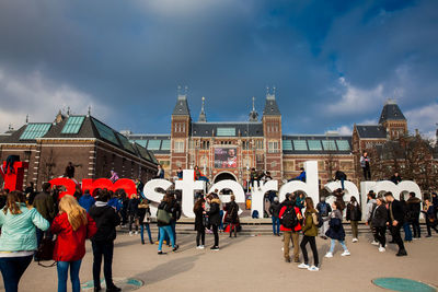 Group of people in front of building