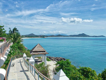 High angle view of swimming pool by sea against sky